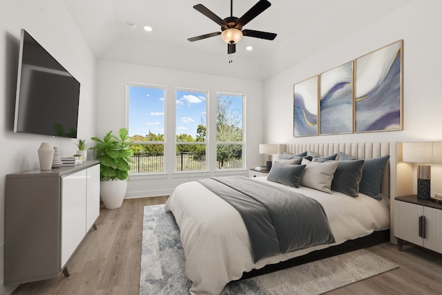 bedroom featuring ceiling fan and light wood-type flooring