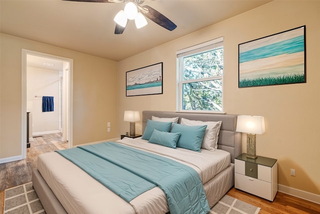 bedroom featuring light hardwood / wood-style flooring and ceiling fan