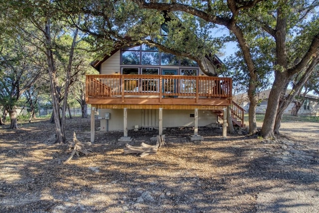 rear view of house with a deck