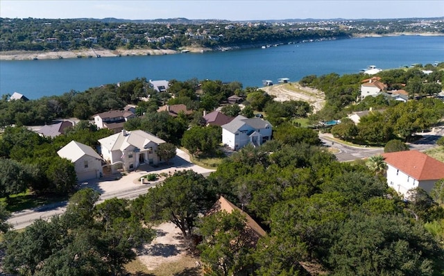 birds eye view of property with a residential view and a water view