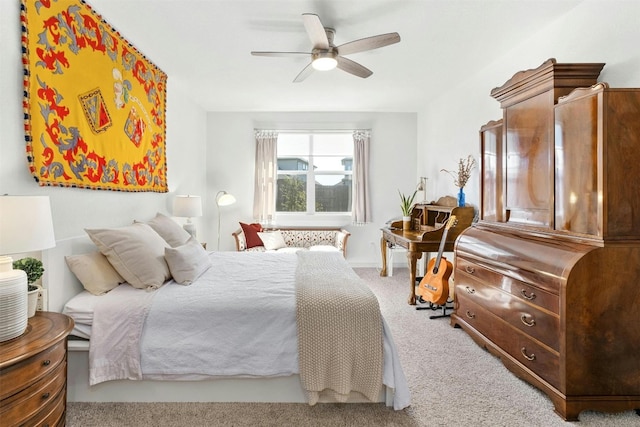 carpeted bedroom featuring a ceiling fan