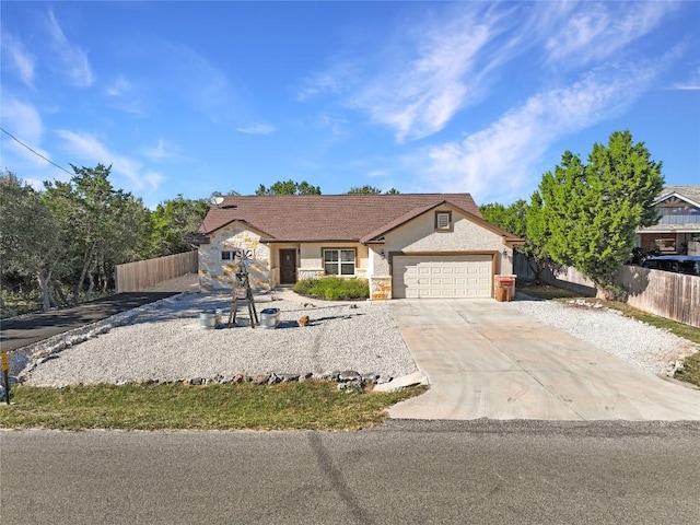 ranch-style home with a garage