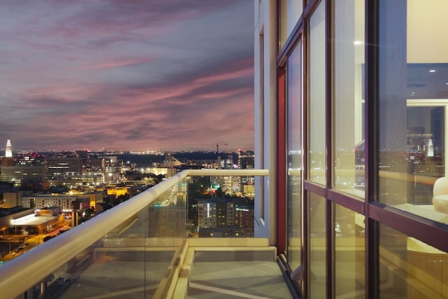 view of balcony at dusk