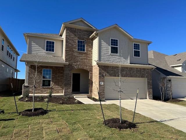 view of front facade featuring a front lawn and a garage