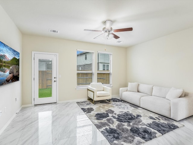 living room with ceiling fan