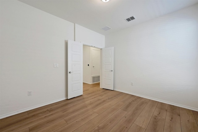 unfurnished bedroom with light hardwood / wood-style flooring