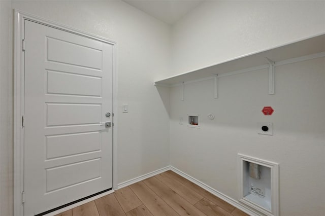 laundry room with washer hookup, gas dryer hookup, hookup for an electric dryer, and light hardwood / wood-style flooring