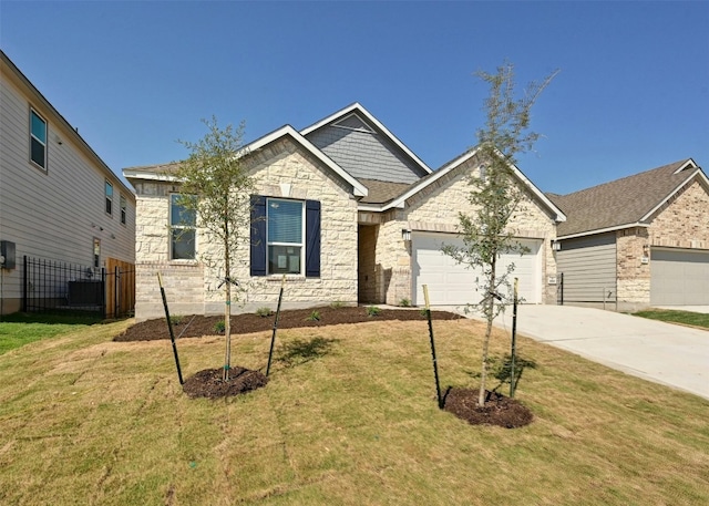 craftsman inspired home with central air condition unit, a front yard, and a garage