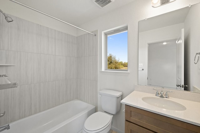 full bathroom with vanity, toilet, and washtub / shower combination