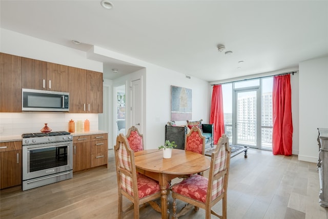 dining room featuring light hardwood / wood-style floors