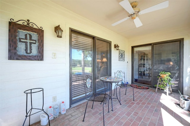 view of patio / terrace featuring ceiling fan