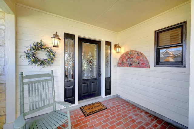 entrance to property with a porch