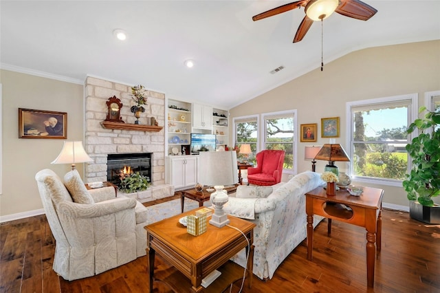 living room with lofted ceiling, a fireplace, dark wood finished floors, and baseboards