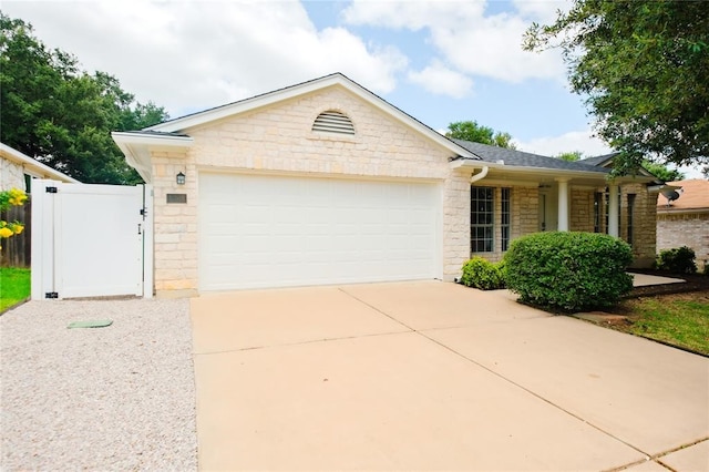 ranch-style home with a garage