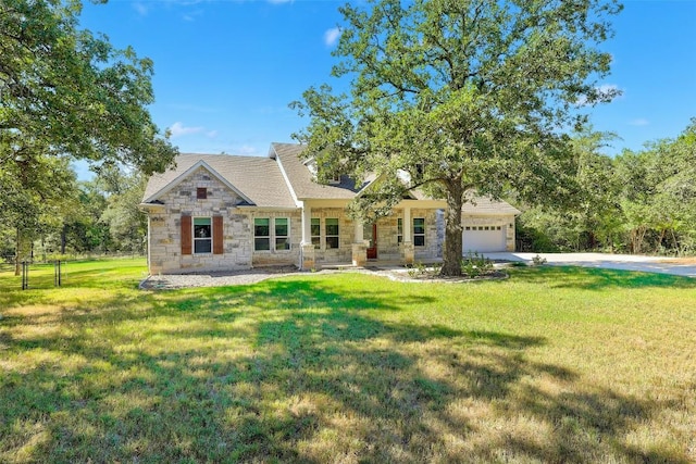 craftsman-style house with a garage and a front yard