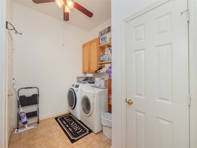 clothes washing area featuring ceiling fan, separate washer and dryer, light tile patterned floors, and cabinets