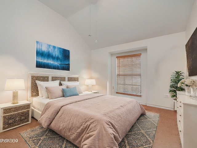 bedroom featuring carpet flooring and high vaulted ceiling