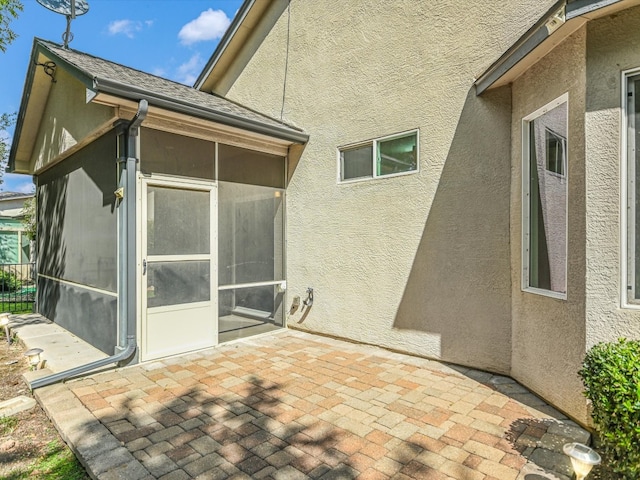 back of house with a patio