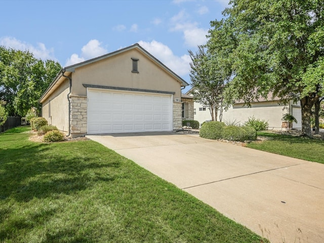 ranch-style house with a front yard and a garage