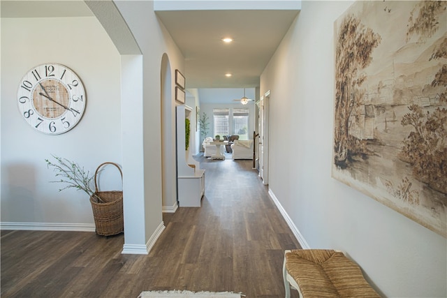 hall with dark wood-type flooring