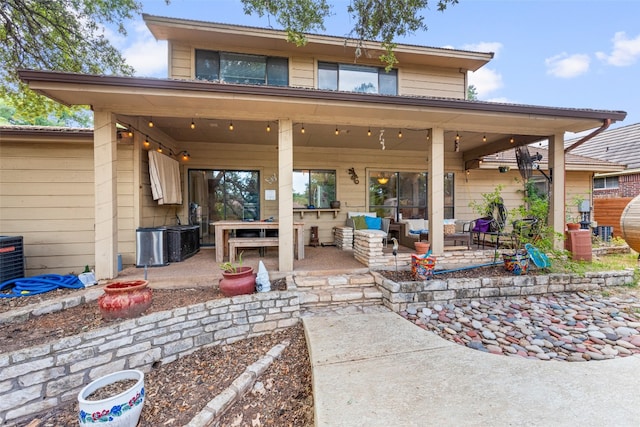 view of patio / terrace featuring ceiling fan