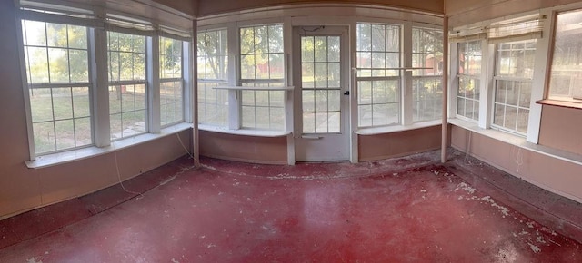 421 Fm 845, Cameron, TX 76520 - unfurnished sunroom with healthy amount of natural light and arched walkways