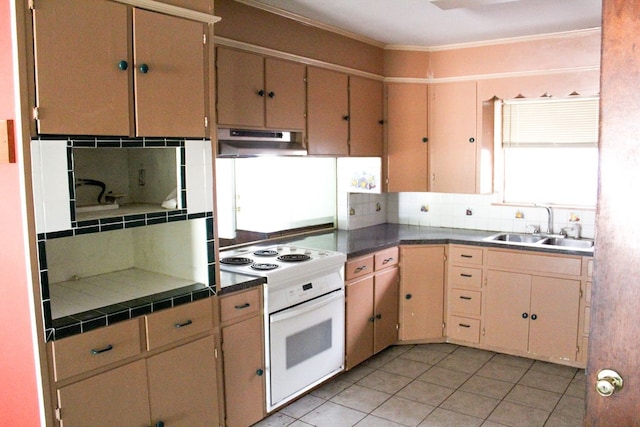 kitchen featuring electric range, light tile patterned flooring, sink, decorative backsplash, and crown molding