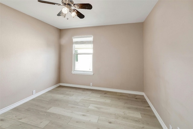 spare room with ceiling fan and light hardwood / wood-style floors