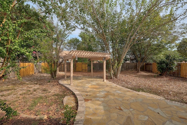 view of yard with a patio and a pergola