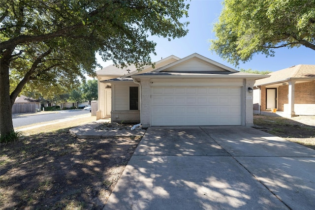 single story home with a garage