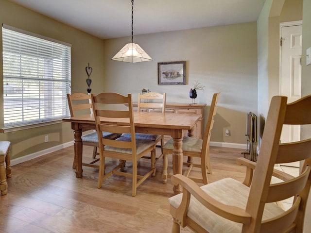 dining space featuring light hardwood / wood-style flooring