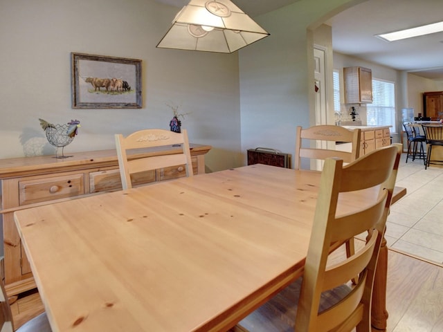 dining area featuring light wood-type flooring