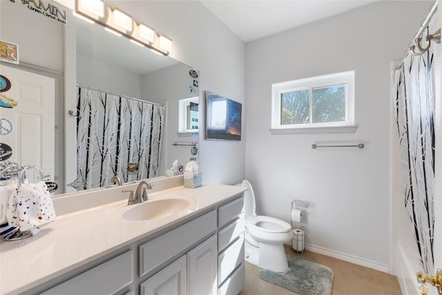 13639 Abrahamson Rd, Manor, TX 78653 - full bath with vanity, toilet, tile patterned floors, shower / bathtub combination with curtain, and baseboards