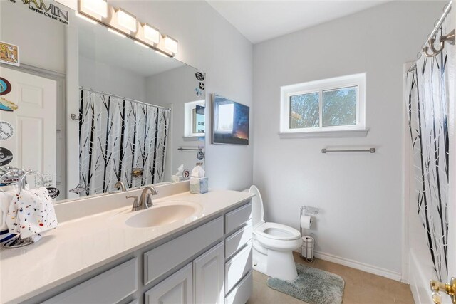 13639 Abrahamson Rd, Manor, TX 78653 - full bath featuring vanity, tile patterned flooring, and shower / bath combination with curtain