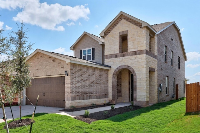 view of front facade featuring a garage and a front lawn