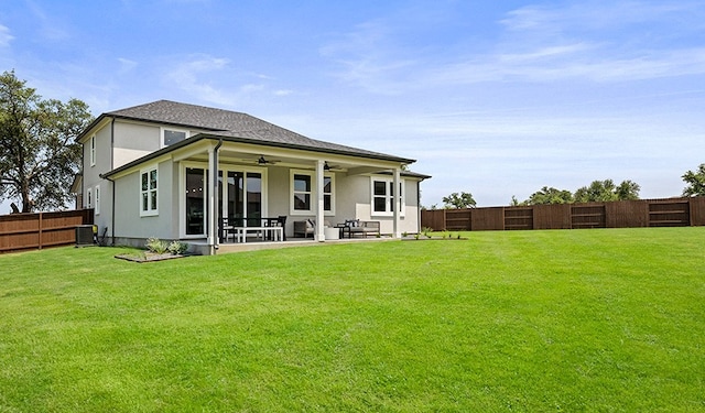 back of house with a patio area, a yard, ceiling fan, and central air condition unit