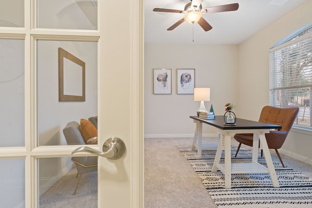 office with ceiling fan and carpet