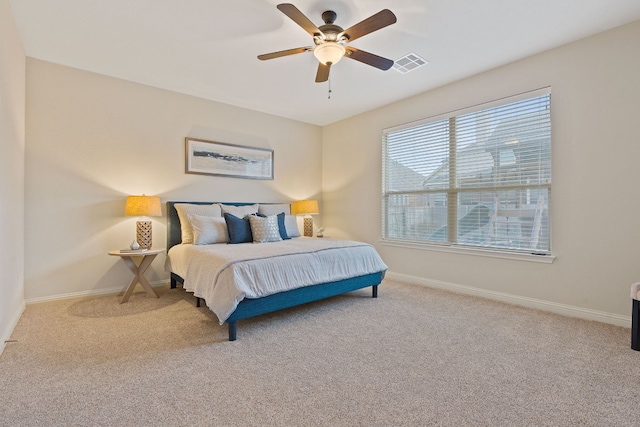 bedroom featuring ceiling fan and carpet floors