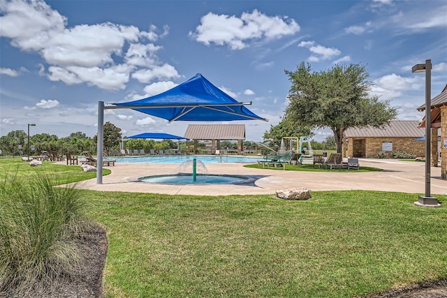 view of home's community with a yard, a swimming pool, and a patio area