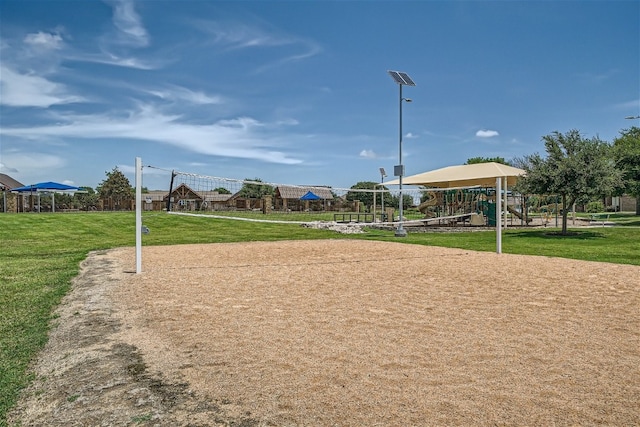 surrounding community with a gazebo, a lawn, and volleyball court