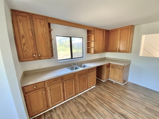 kitchen featuring light hardwood / wood-style flooring and sink