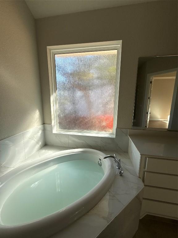 bathroom with plenty of natural light