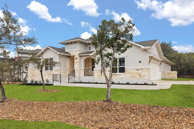 rear view of house with a garage and a lawn