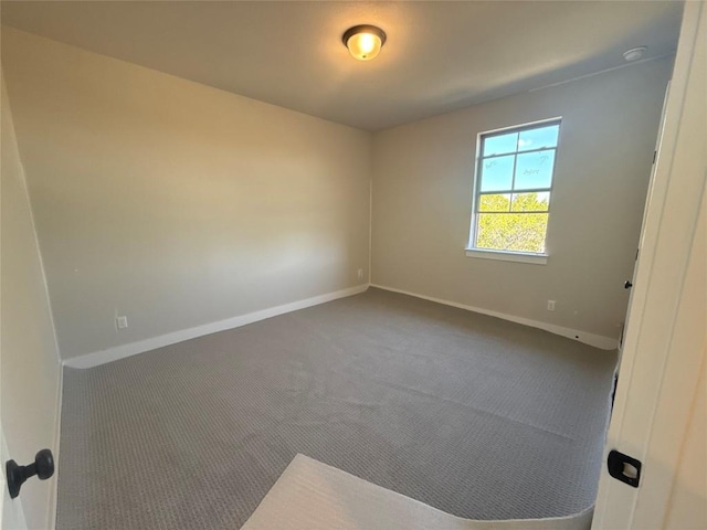 unfurnished room with carpet flooring