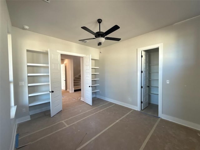 unfurnished bedroom featuring ceiling fan