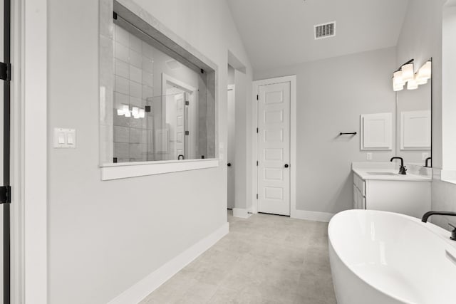 bathroom with independent shower and bath, vanity, and lofted ceiling