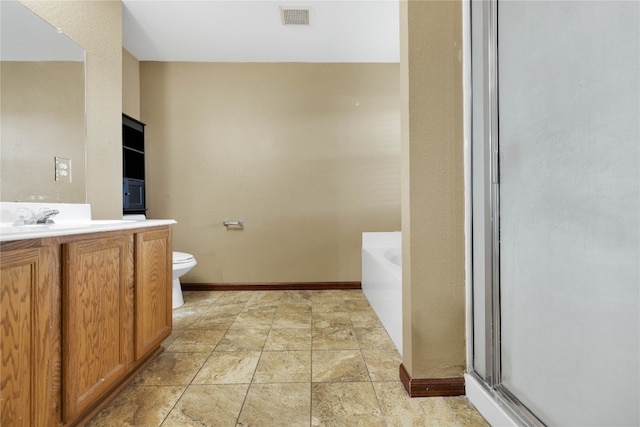 full bathroom featuring independent shower and bath, vanity, and toilet