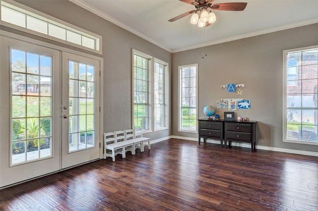 entryway featuring french doors, ceiling fan, dark hardwood / wood-style floors, and crown molding