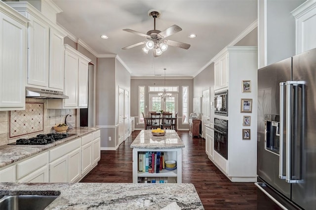 kitchen with tasteful backsplash, white cabinets, ornamental molding, black appliances, and light stone countertops