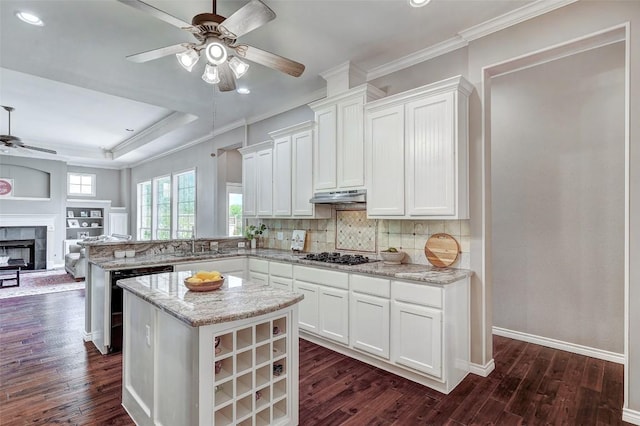 kitchen featuring white cabinetry, black dishwasher, kitchen peninsula, and a kitchen island